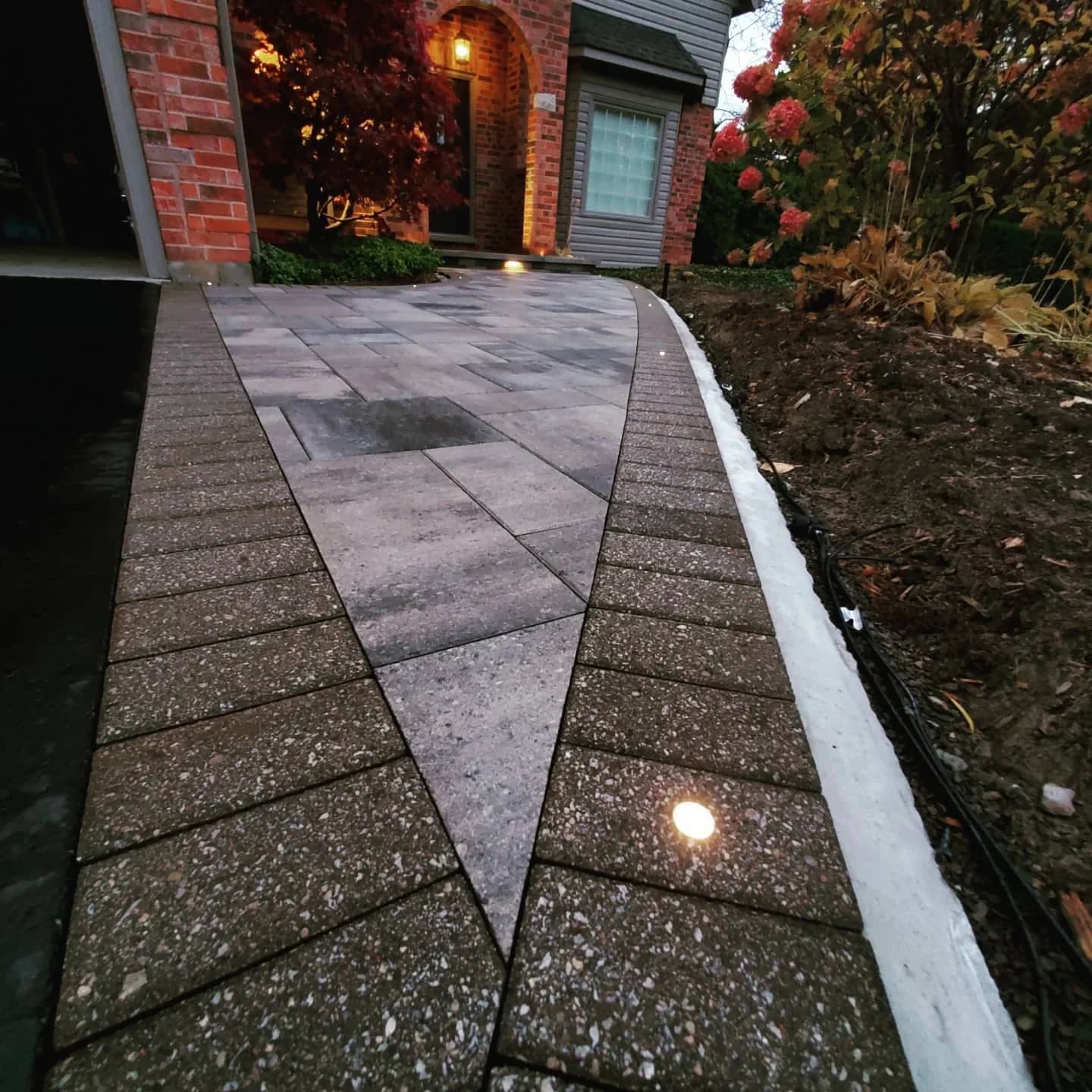 Interlocking Hamilton walkway with landscape lighting and recessed LED paver lights