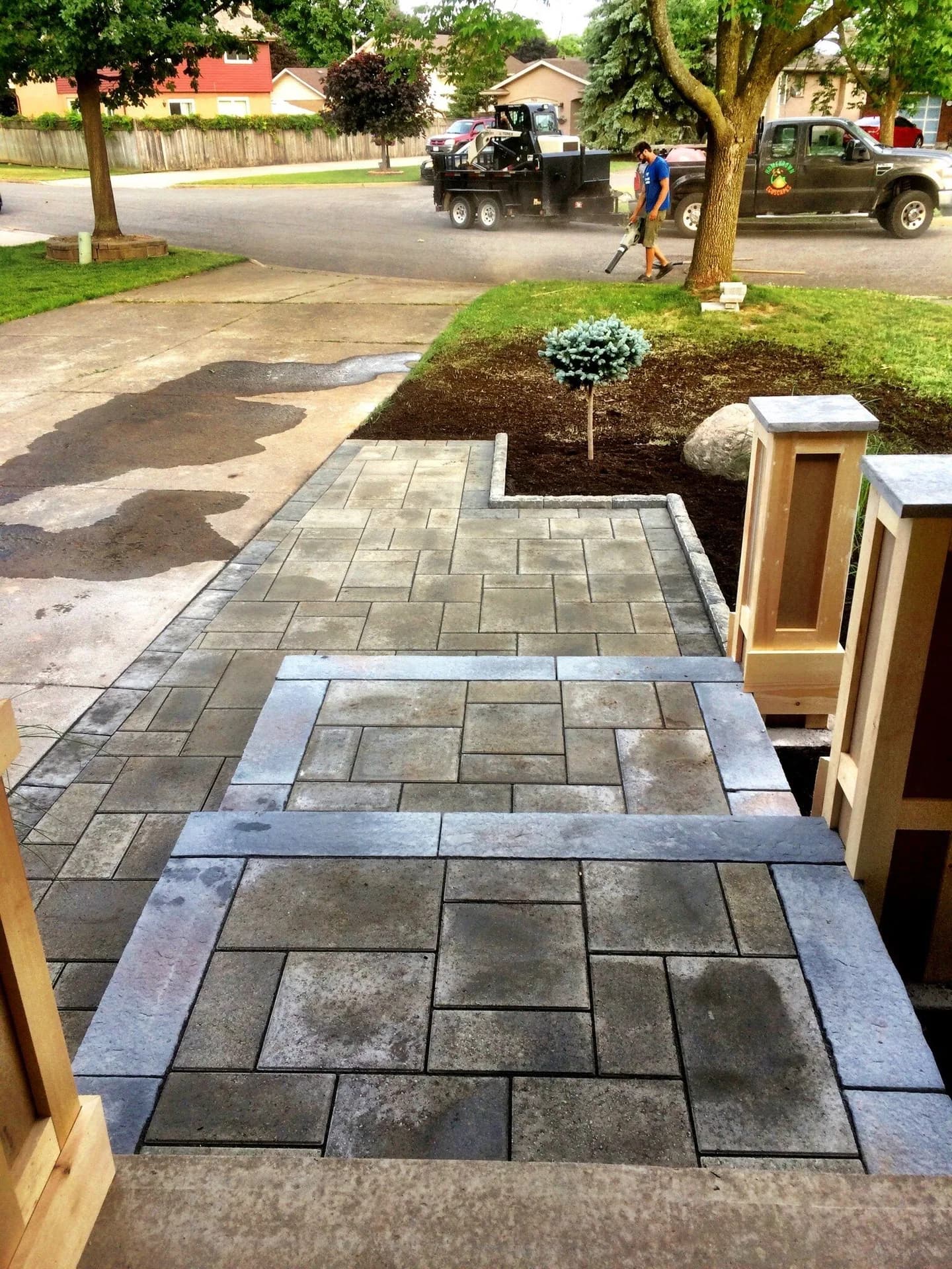 Multi-level interlock steps and walkway with soldier-course edging at a residential front yard in Hamilton, Ontario